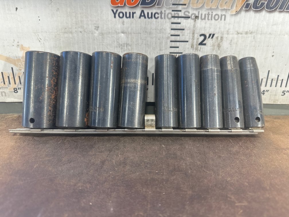 Approx. 9 Deep Well Impact Sockets on Metal Rail
