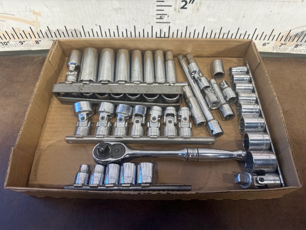 Socket Set with Ratchet and Extensions on Storage Rails