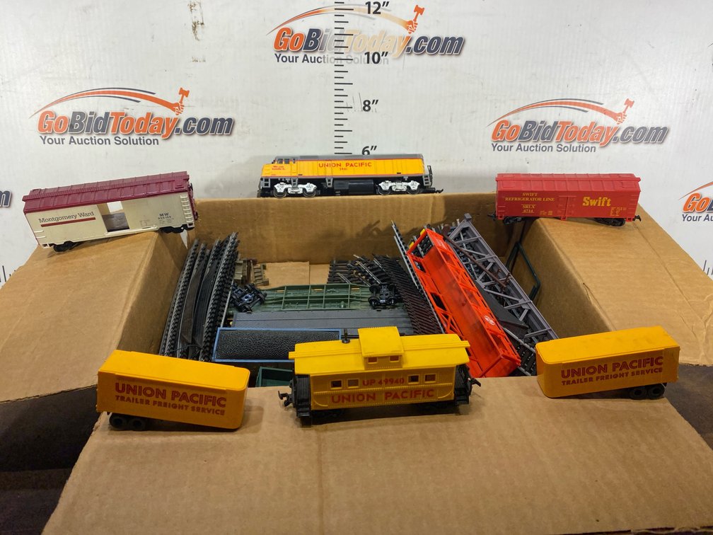 Model Train Locomotive, Rolling Stock, Track, and Accessories Lot
