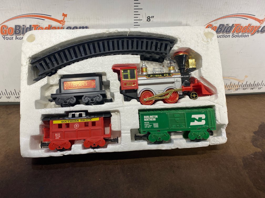 Model Train Set with Locomotive, Tender, Boxcar, Caboose, and Track