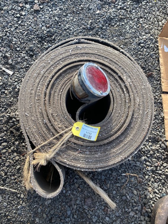 Coiled Woven Flat Belt and Vintage Vehicle Tail Light