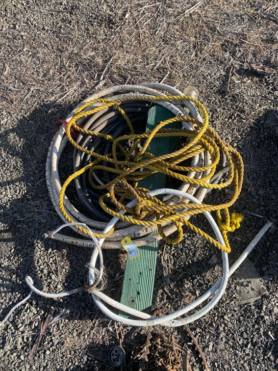 Lot of Hoses, Ropes, Chain with Pulley, and Ribbed Board