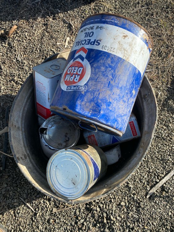 Super RPM Delo and Prestone Oil Cans in Galvanized Metal Tub