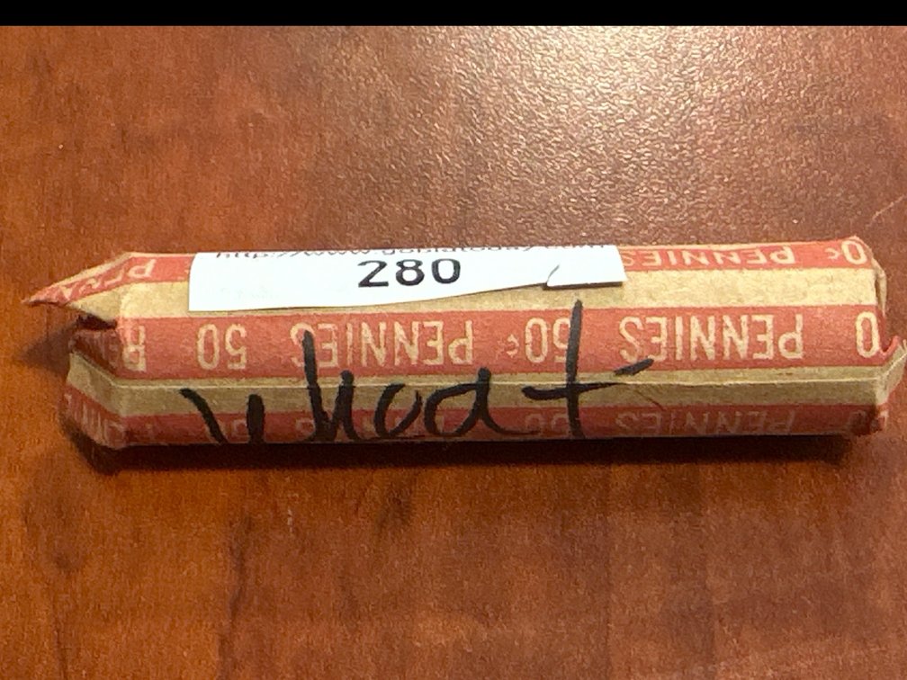 Roll of circulated  US minted Lincoln  wheat cents
