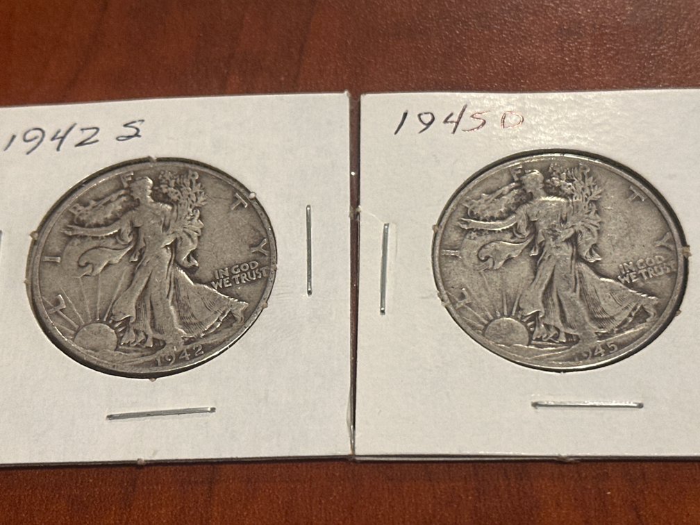 Two US minted walking liberty half dollars
