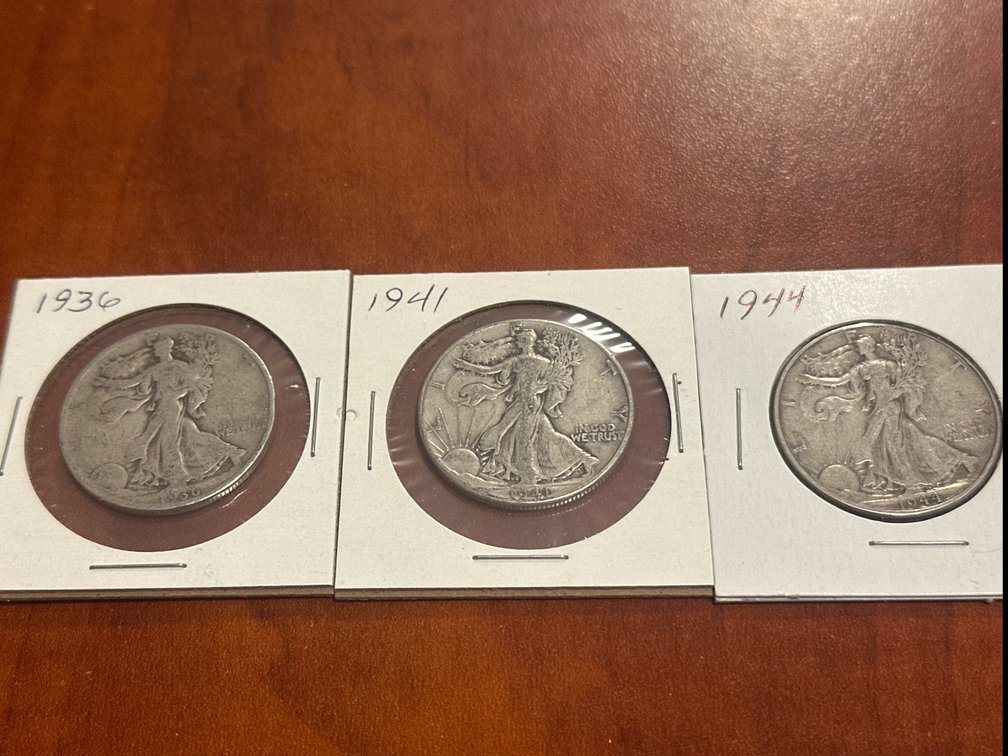 Three US minted silver walking liberty half dollars