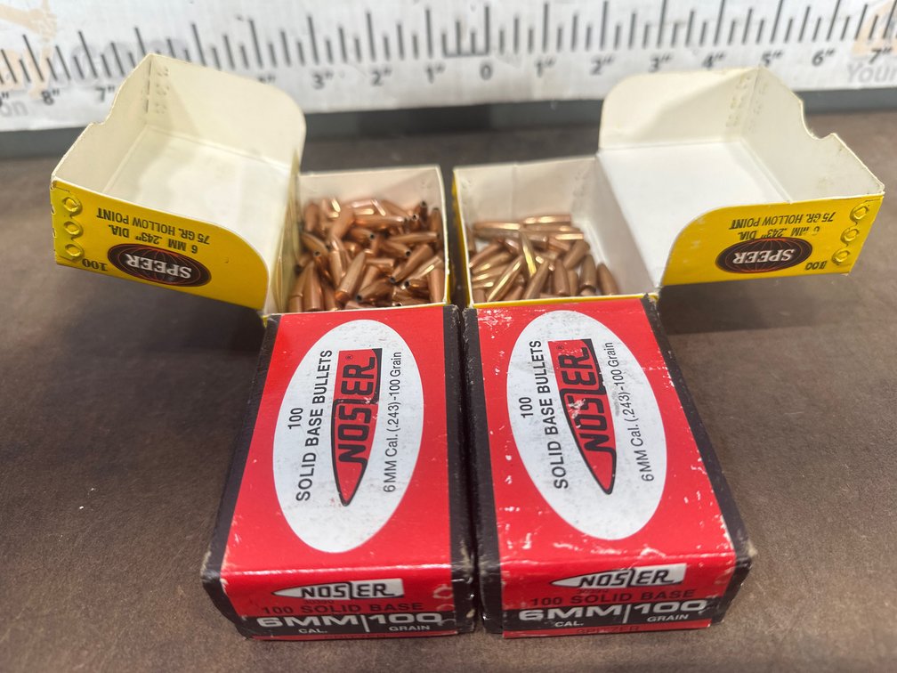 Four boxes of  Speer and Nosler 6mm (.243) Rifle Bullets