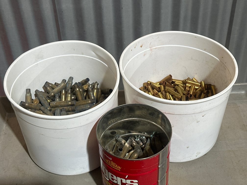 Three containers of  Spent Brass Cartridge Casings in Buckets and Can