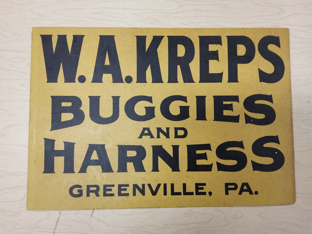 Paperboard Buggies And Harness advertising sign