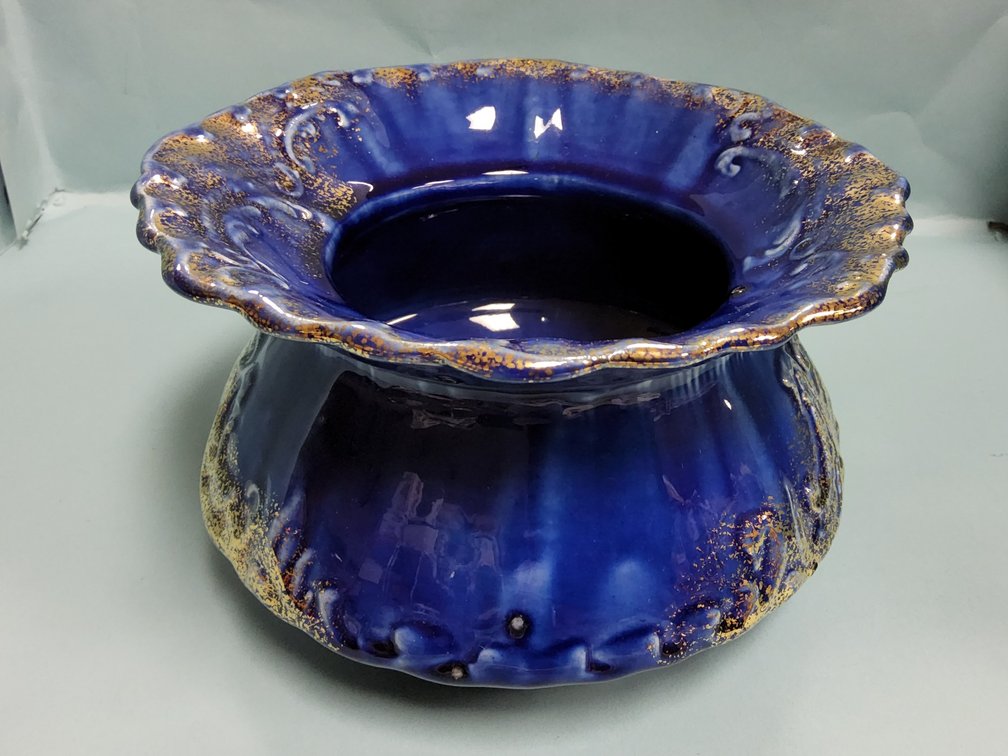 A pretty swanky ironstone spitoon.