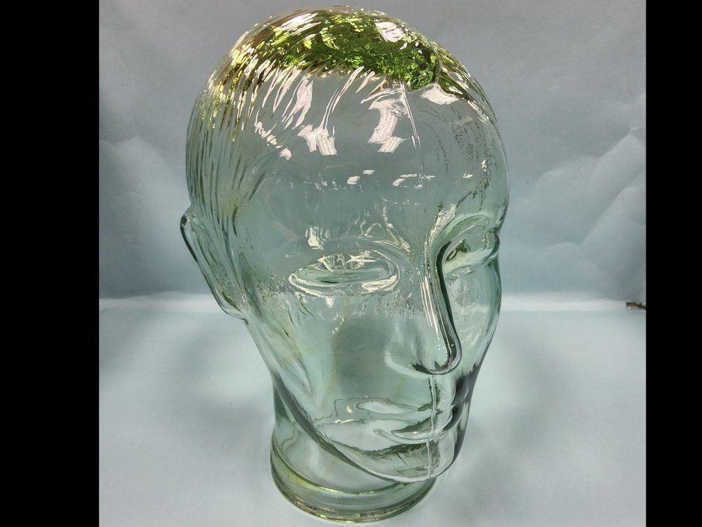 Gen Z man's glass head