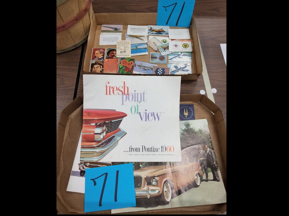 Auto brochures and WWII ID cards