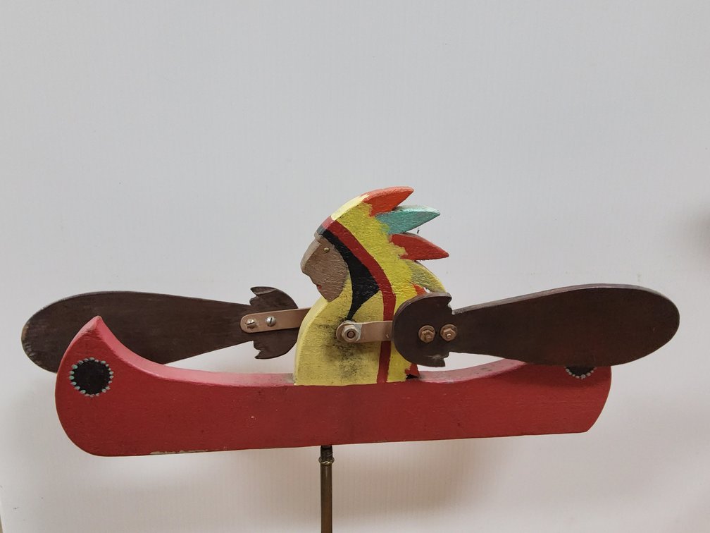 Indian in canoe whirligig 