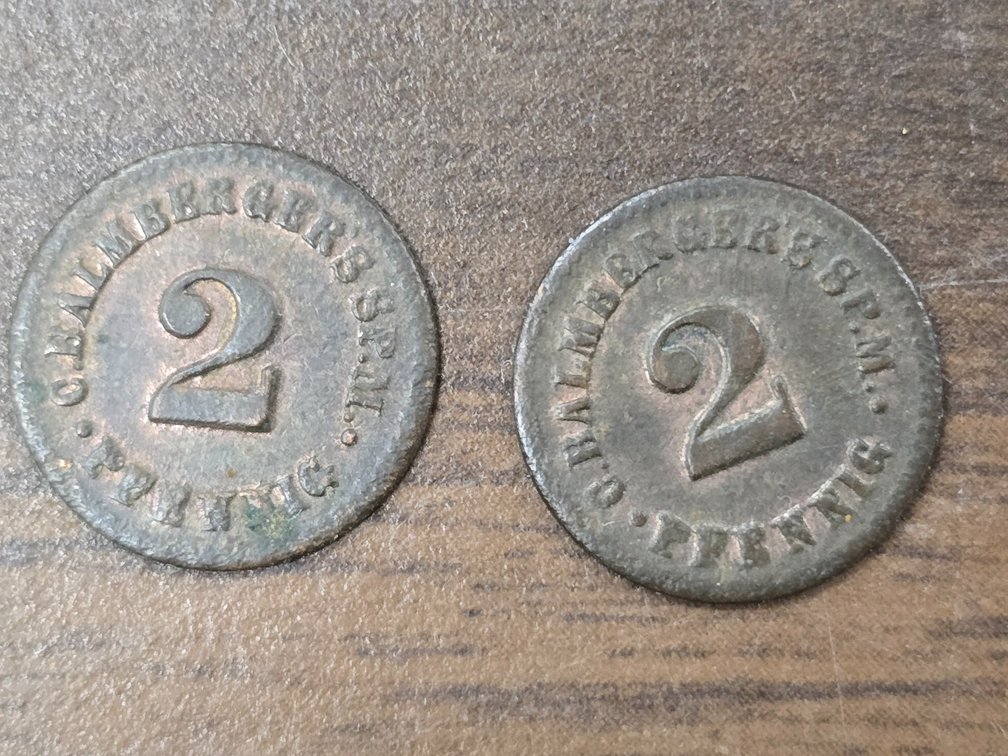 Imperial Germany Pfennig coins and some game tokens.