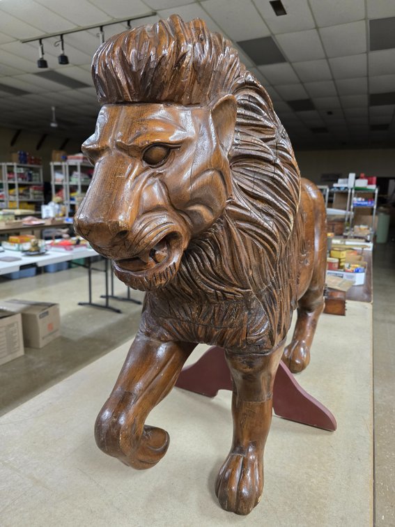 Nicely carved wood lion.
