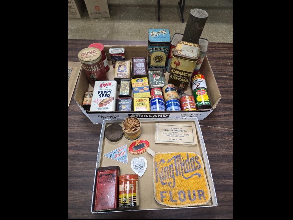Many food and spice tins including cocoa