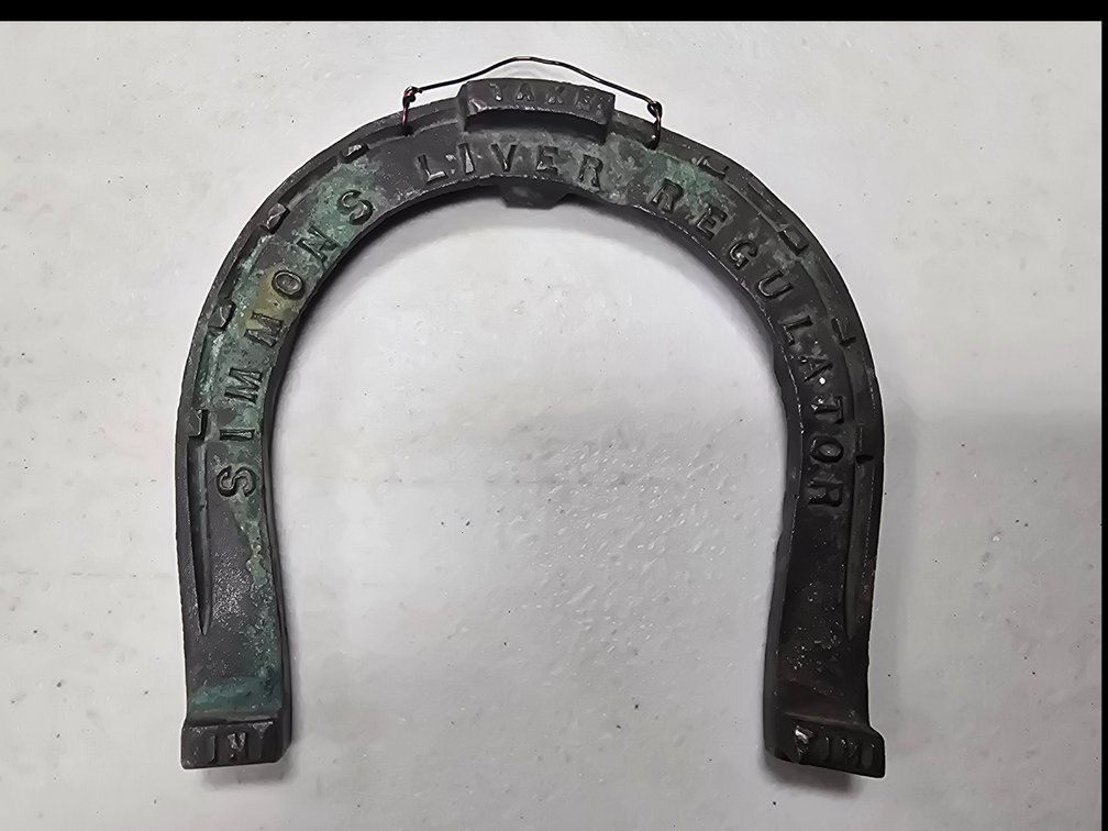 Simmons Liver Regulator cast brass advertising horseshoe