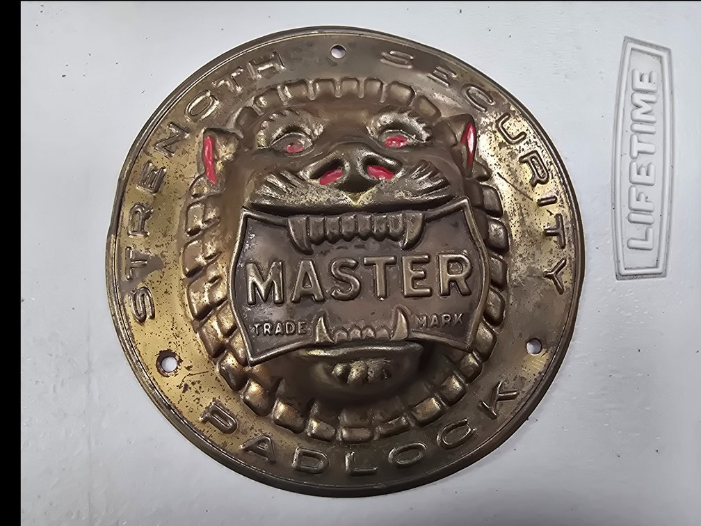 Master lock brass plaque