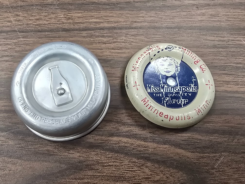 Two patent milk bottle cap removers