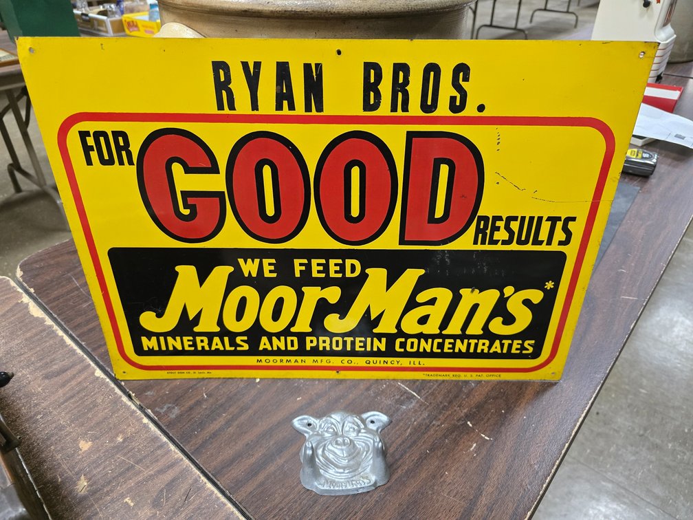 Moorman's Tin Barn Tacker Sign and Pig Hook