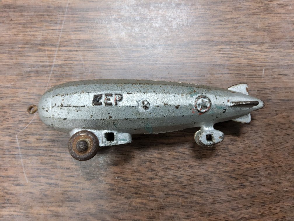 Cast iron Zep pull toy 