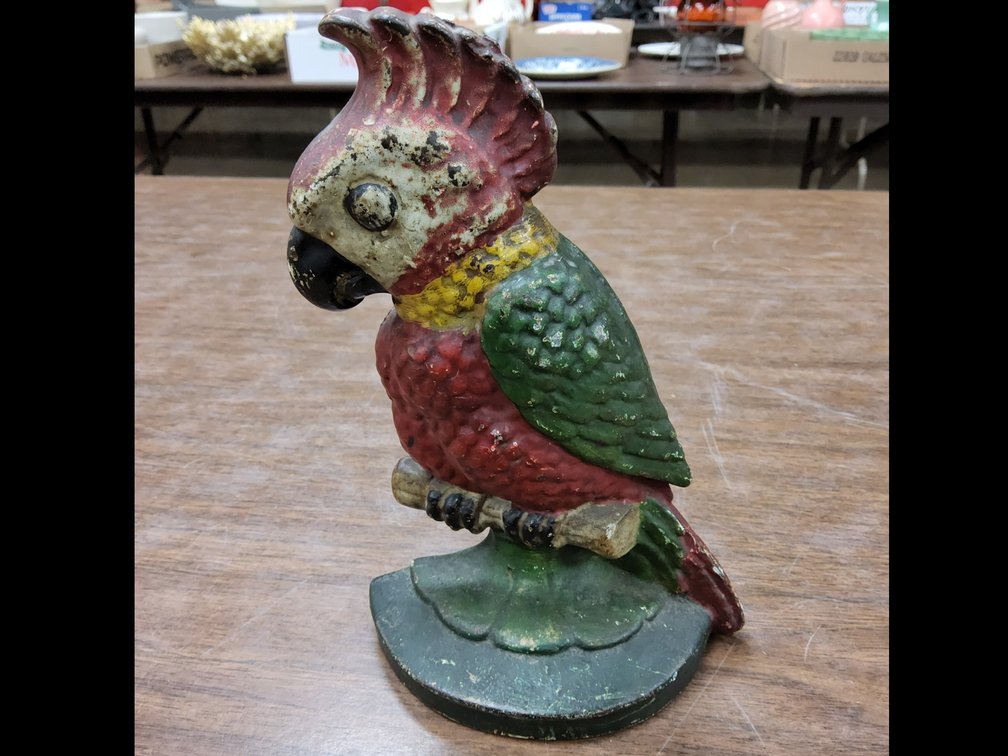 Cast iron parrot door stop