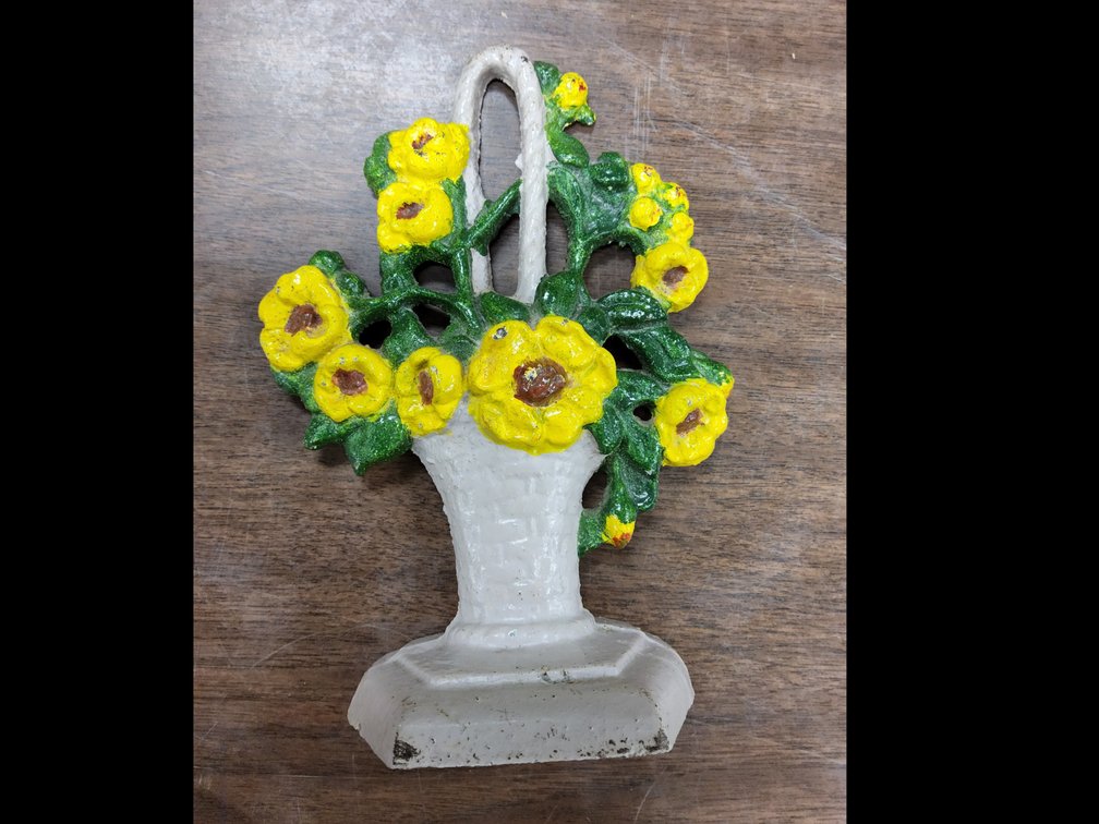 Cast iron flower basket door stop