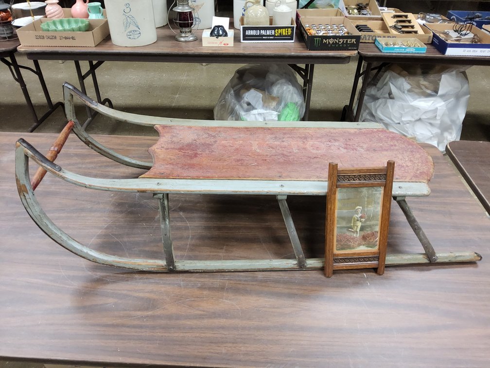 "Victory" child's sled with photograph of owner