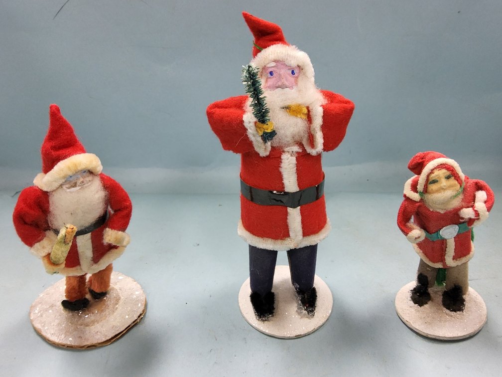 3 clay face Santa's 