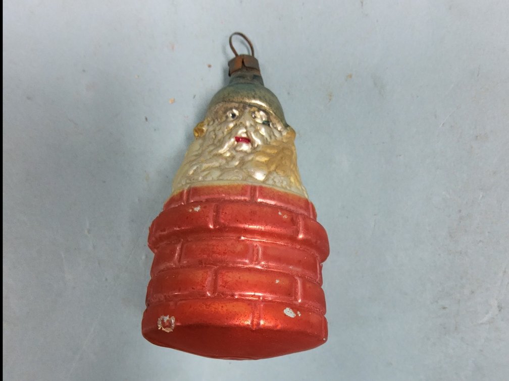 Santa in chimney glass ornament