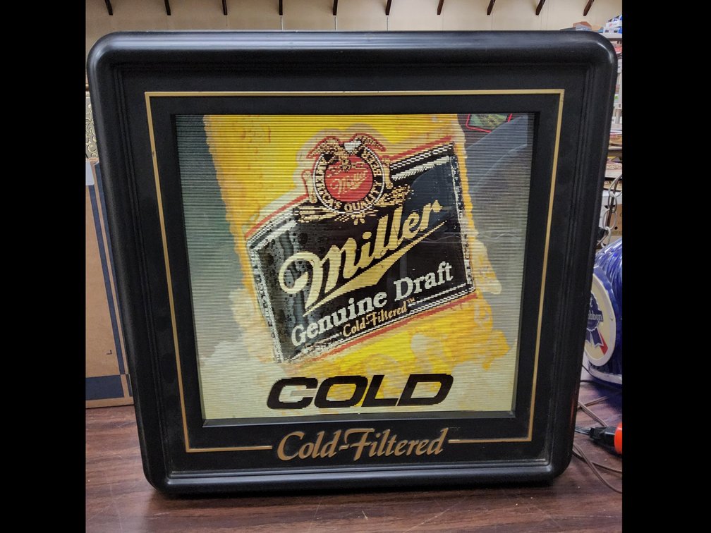 Miller lighted Lenticular 3 image sign