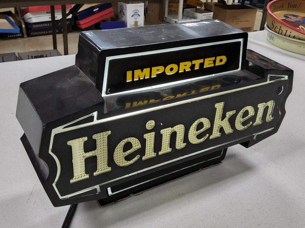 Lighted Heineken cash register sign.