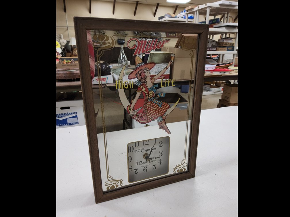 Miller girl in the moon, mirror with clock