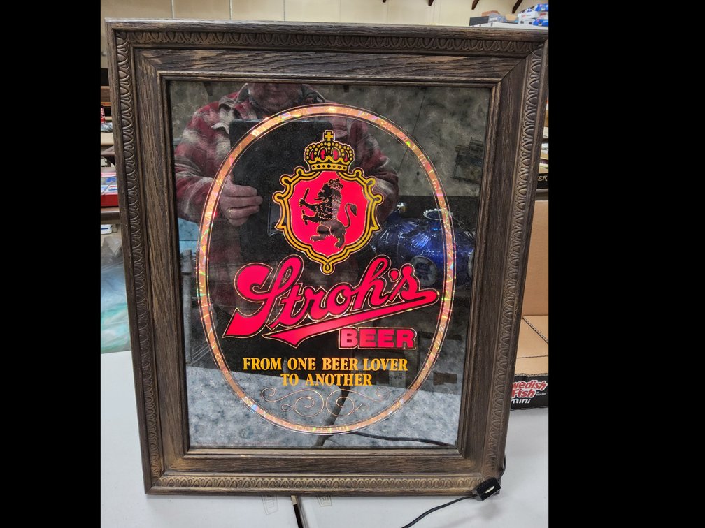 Stroh's lighted prismatic sign