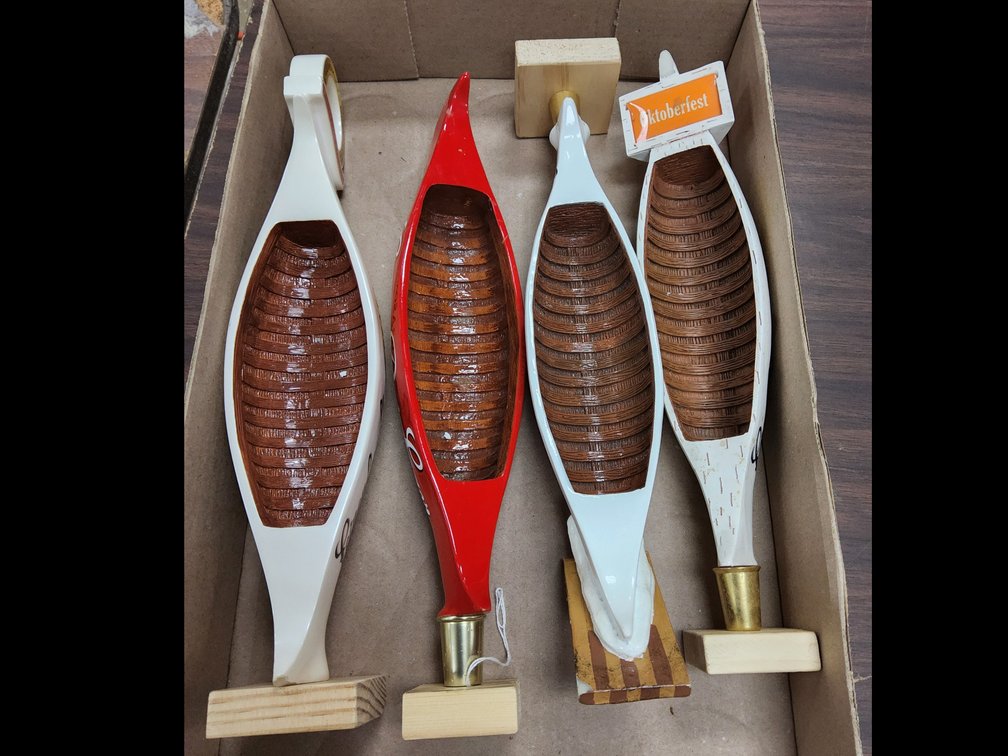 4 Leinenkugel canoe tap handles