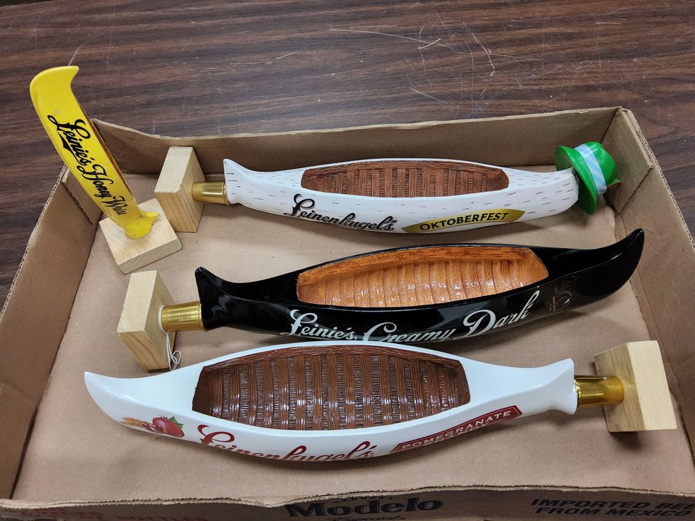 4 Leinenkugel canoe tap handles