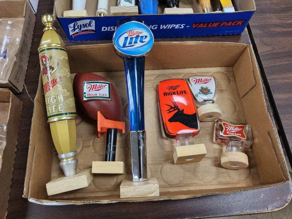 Assorted Miller tap handles