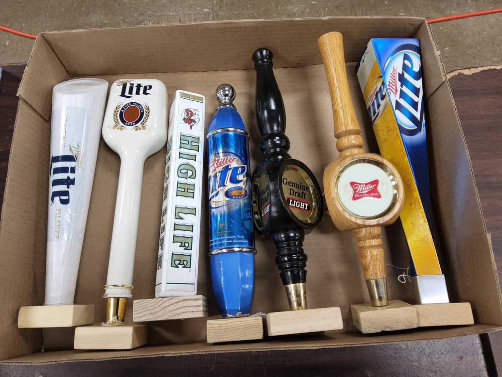 Assorted Miller tap handles