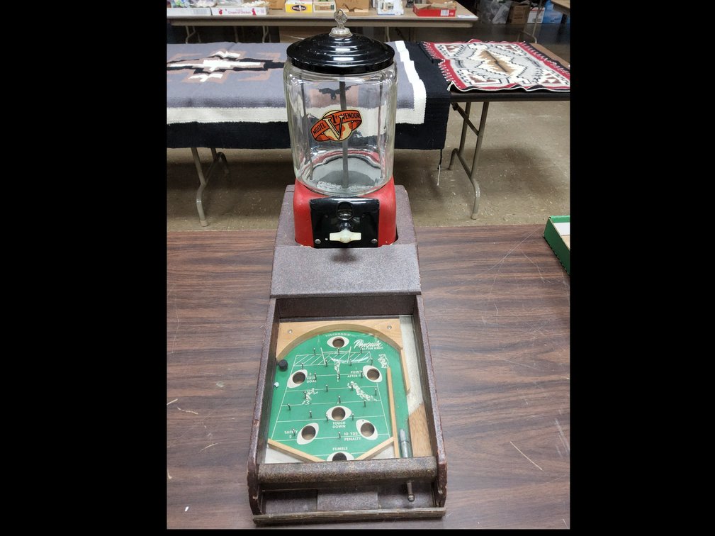 Victor Vending Corp. 1 cent gumball vendor in Penguin football housing