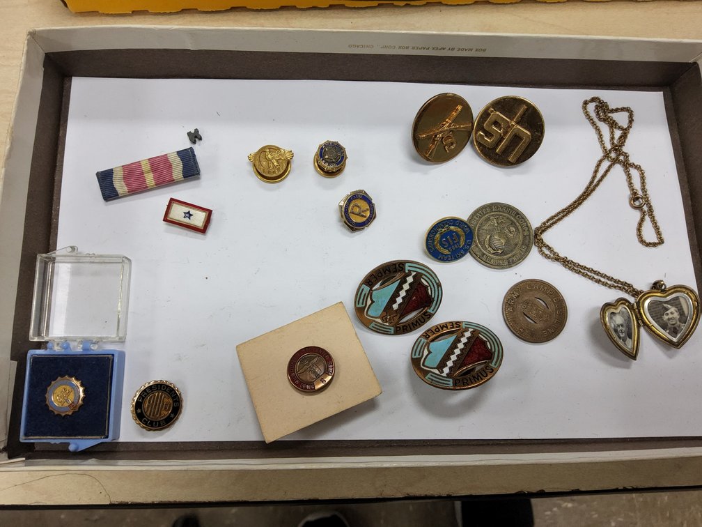 Assorted military pins and other jewelry