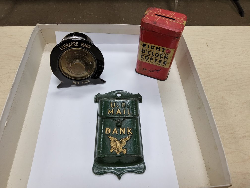 Cast iron, novelty and advertising banks 