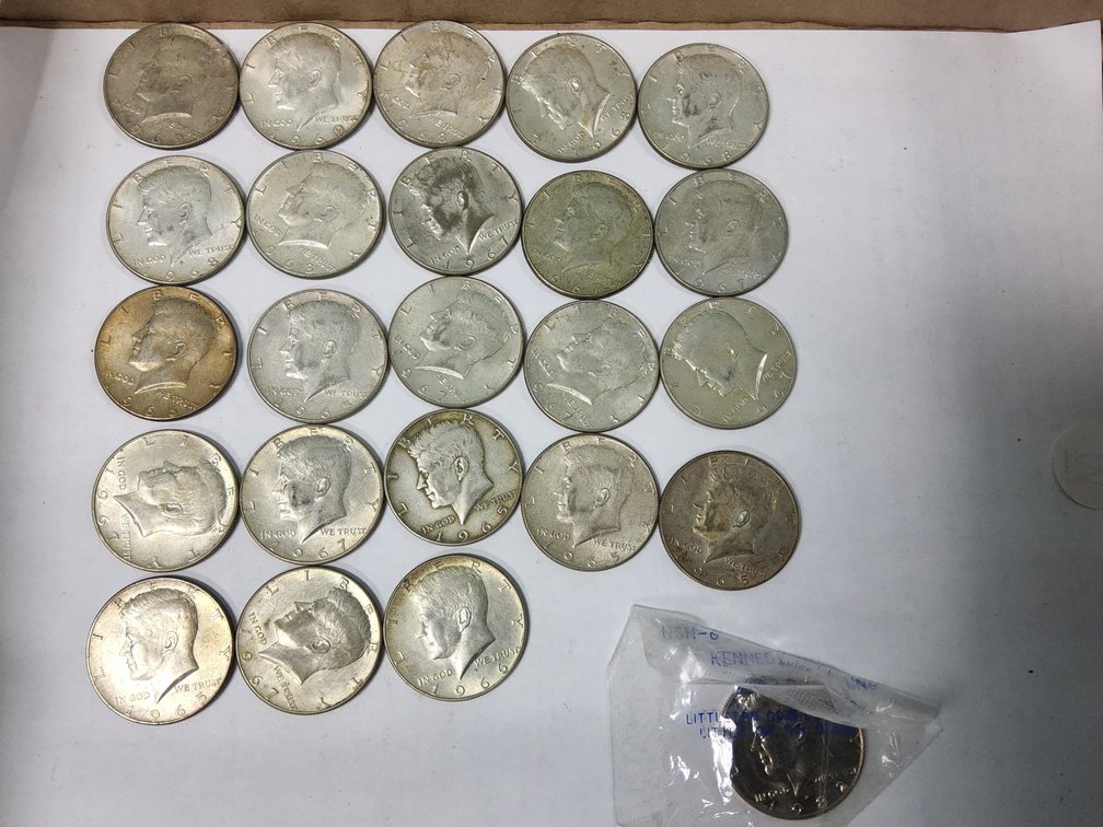 23, 40% Kennedy halves and a 1982D Unc