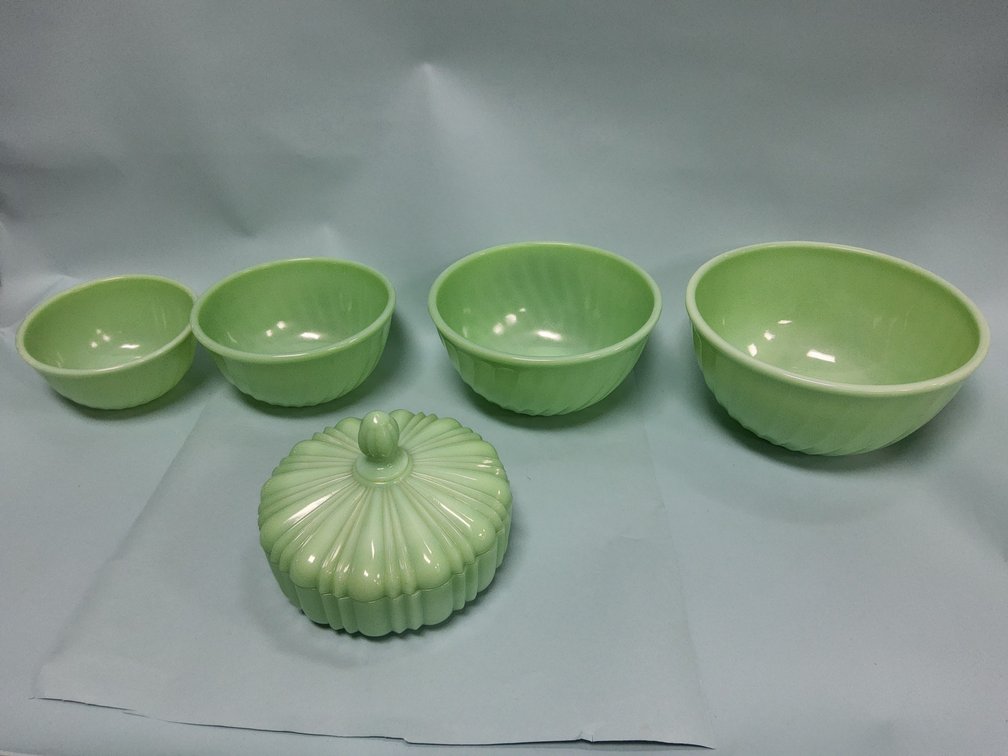 Nest of 4 Fire King Jadeite bowls and a Jadeite covered candy.