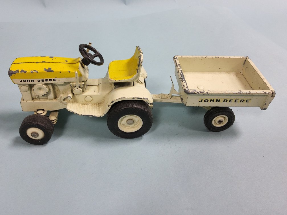 Scarce John Deere Patio toy tractor and trailer in April Yellow