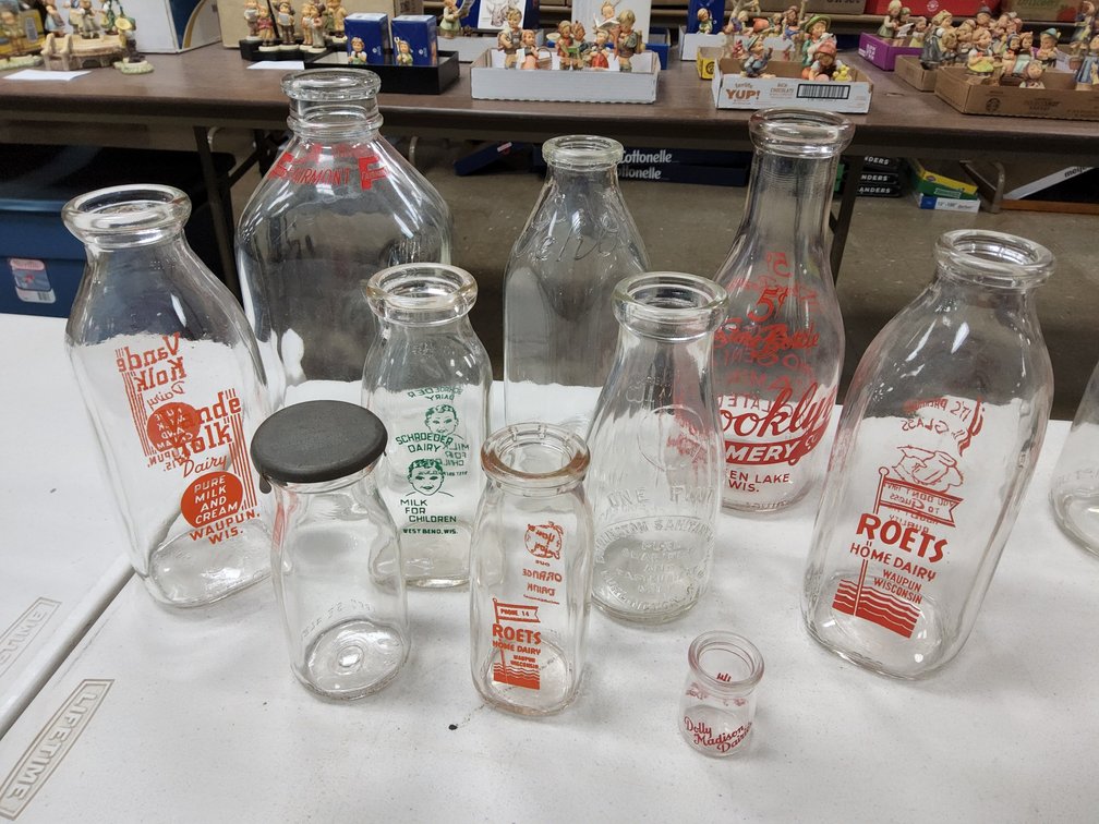 Waupun West Bend, Green Lake, Burlington and other milk and dairy bottles.