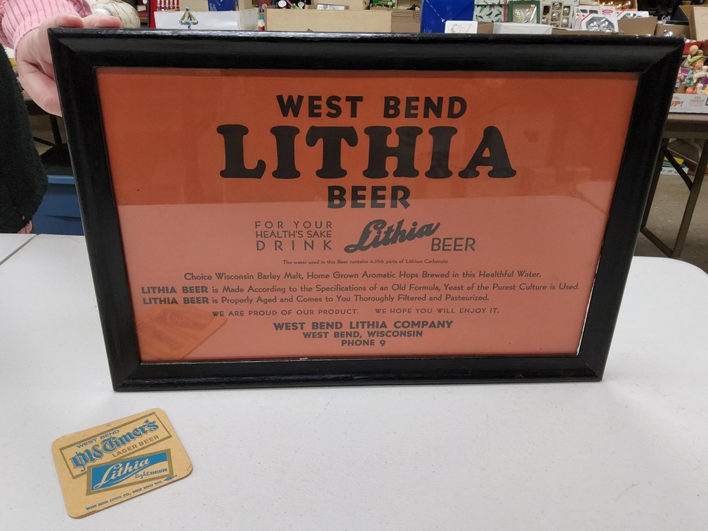West Bend Lithia framed case topper and a coaster