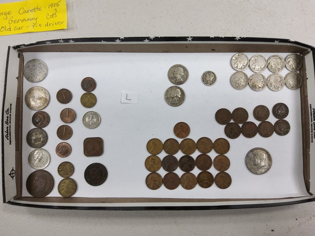 Assorted US and the foreign coins includes some silver.