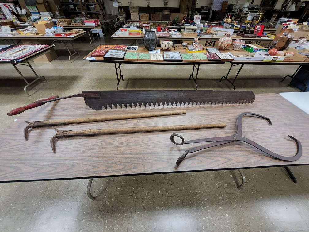 Ice saw,  2 hooks and a drag tongs 