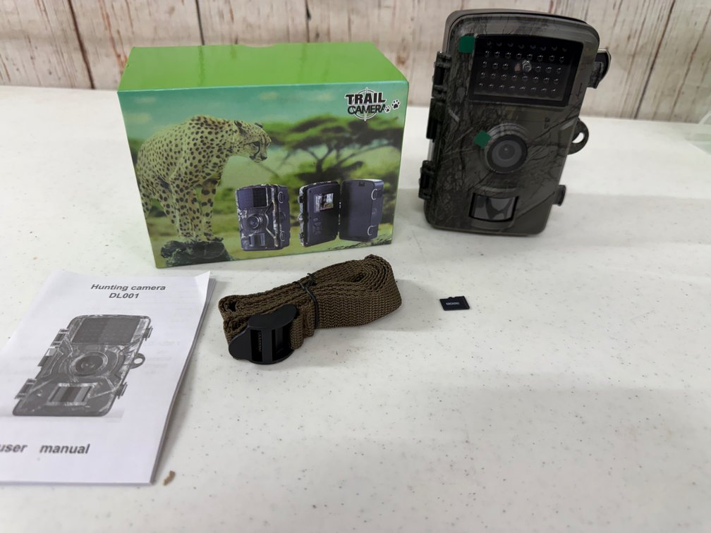 1080p Trail Cam with screen for checking on site. Comes with memory card!