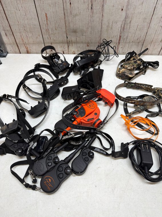 Lot of sport dog collars and controls and a few chargers
